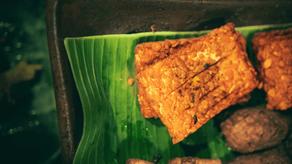 fried tempeh in a pandan leaf,indonesian vegetarian food bali